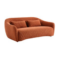 **Moderne bank in oranje textiel met kussens**
